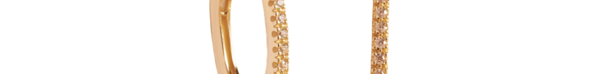 Aros Ovalados de Oro Amarillo 14K con Circonita