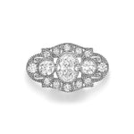 Anillo Vintage Art Déco Tres Piedras con Diamante Oval en Platino