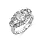 Anillo Vintage Art Déco Tres Piedras con Diamante Oval en Platino